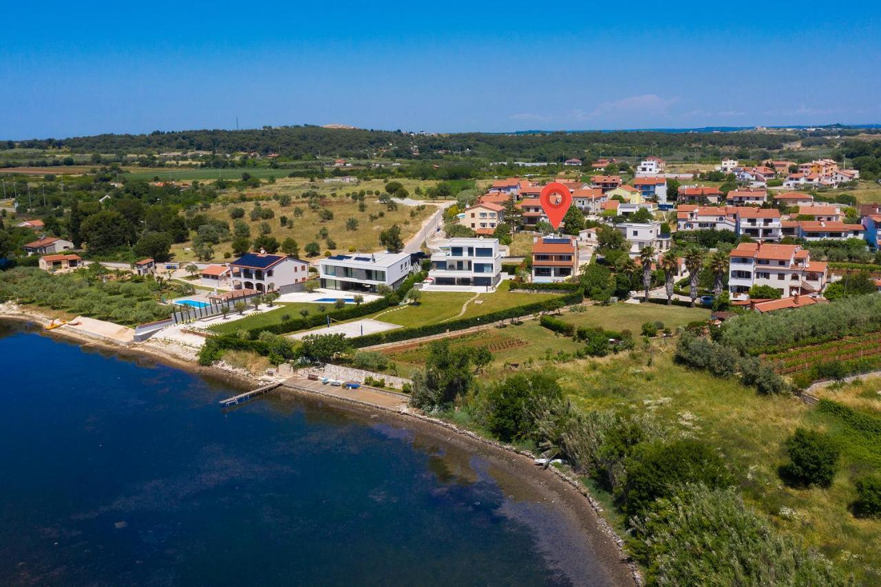 Villa Suprema Pomer Bagian luar foto