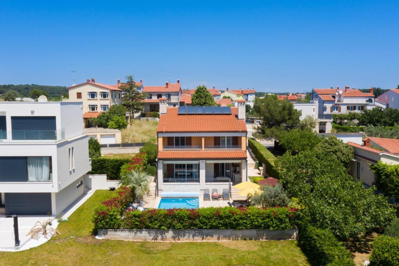 Villa Suprema Pomer Bagian luar foto