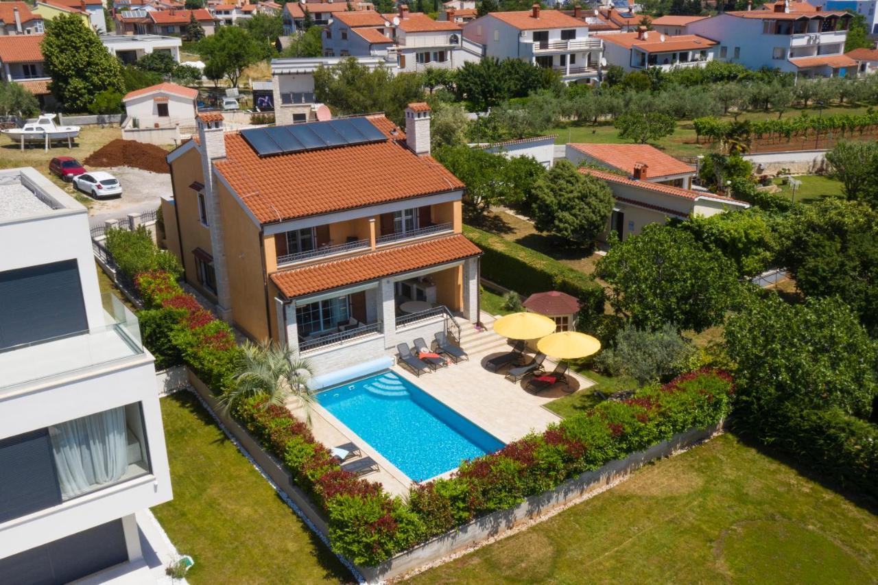 Villa Suprema Pomer Bagian luar foto